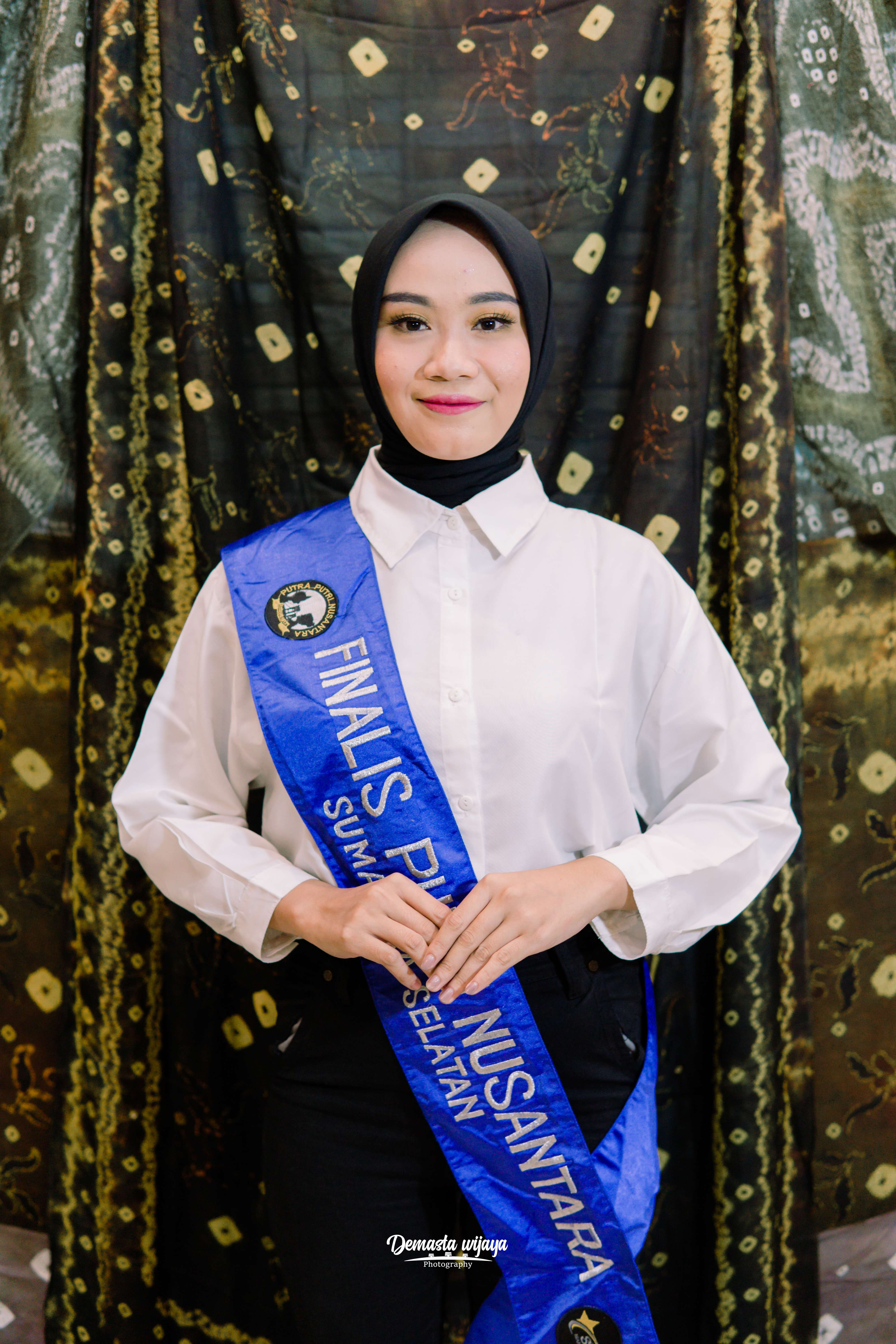 SHERLY SUSANTI